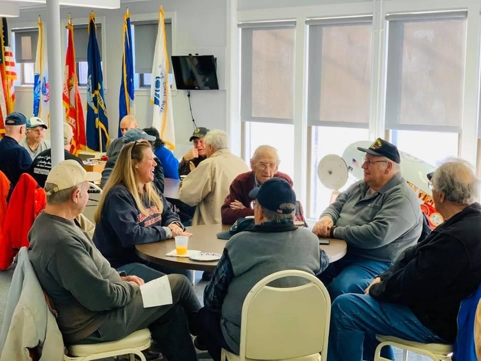 Veterans and community members at a Newbridge Place fundraising event